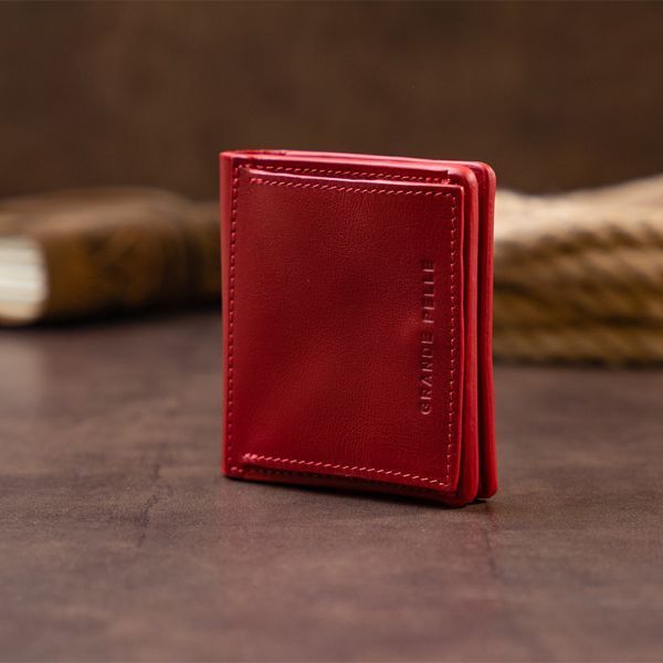 Вертикальне глянсове портмоне з накладною монетницьою GRANDE PELLE 11331 Червоне 11331 фото
