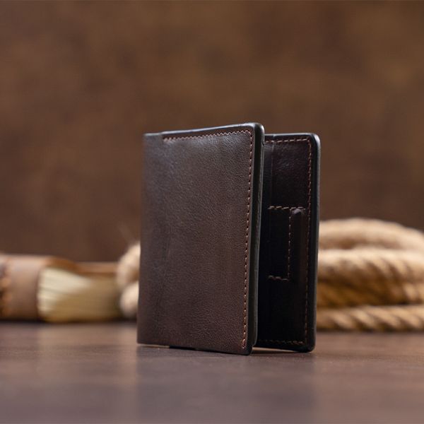 Вертикальне портмоне-кредитниця комбі в гладкій шкірі GRANDE PELLE 11328 Коричневе 11328 фото