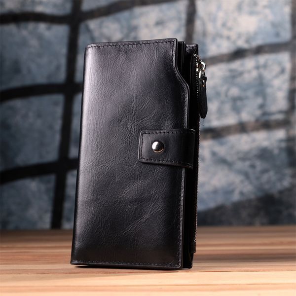 Вертикальный стильный кошелек из гладкой натуральной кожи Vintage 22885 Черный 22885 фото